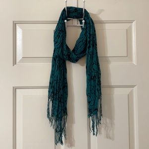 Turquoise scarf with black scroll detail & tassels